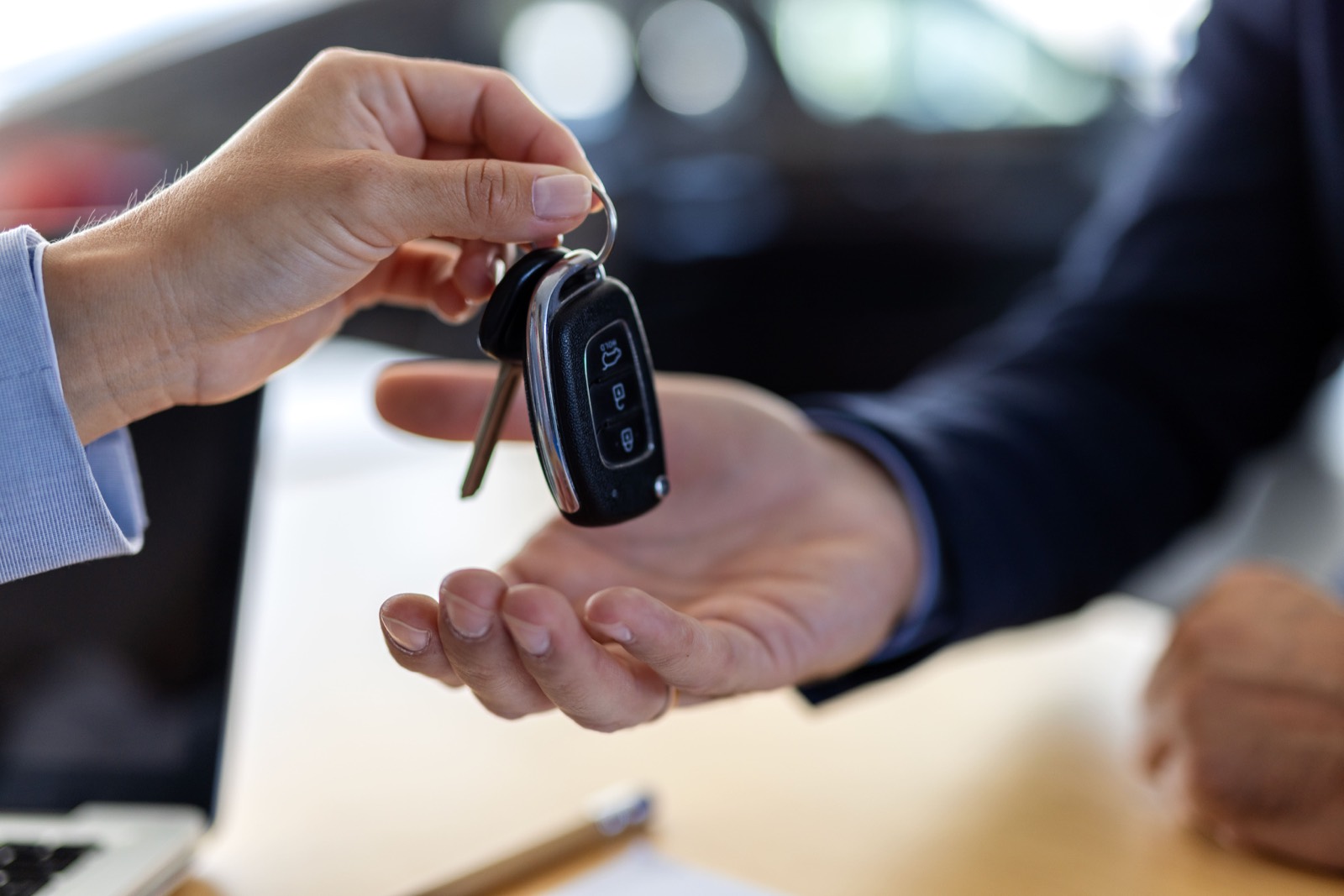 Keys being handed over at the Van District sales desk