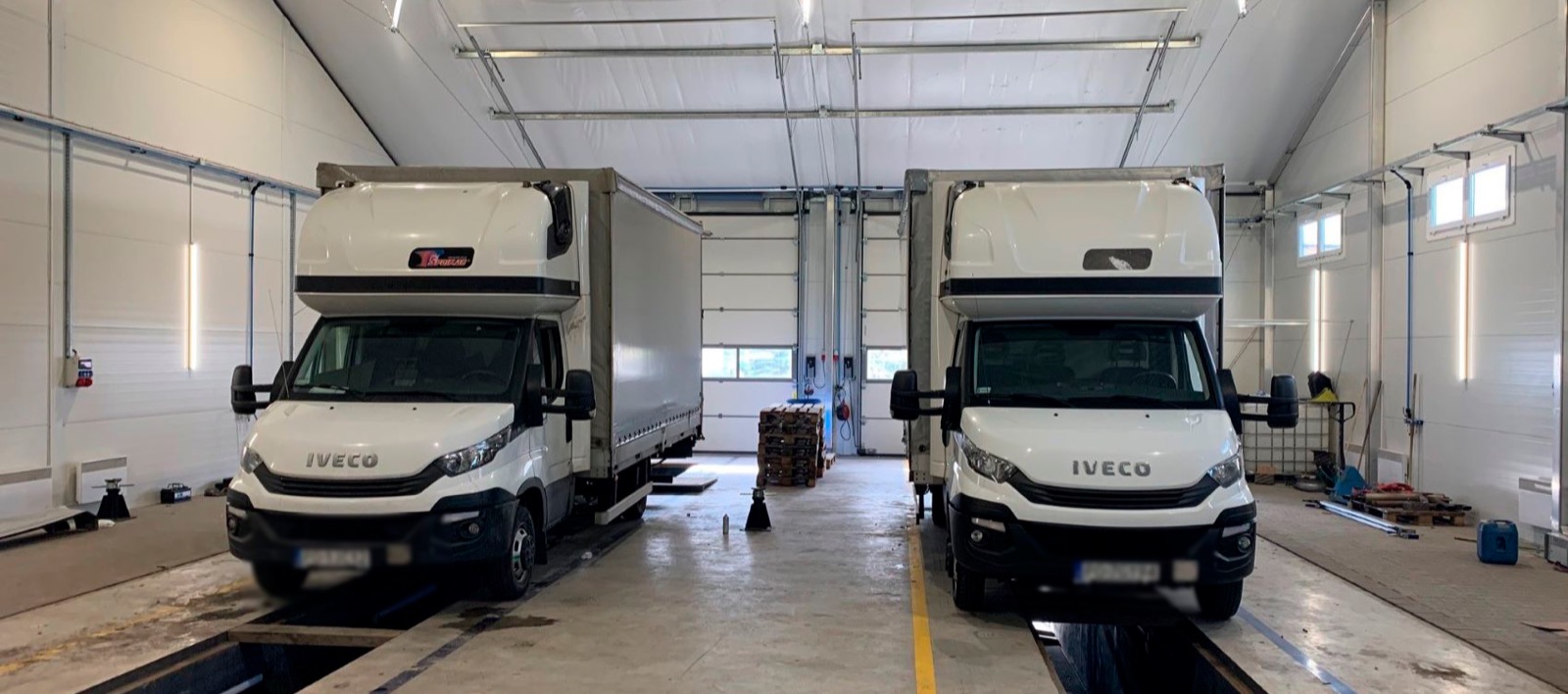 Vans on the ramps in the Van District workshop